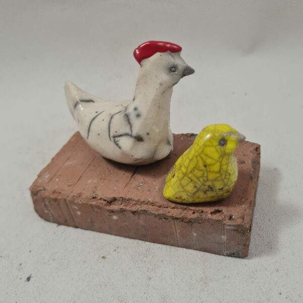 Poule et son Poussin