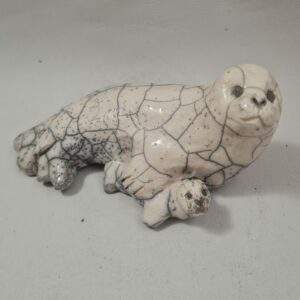 Maman Phoque et son petit - sous son aile
