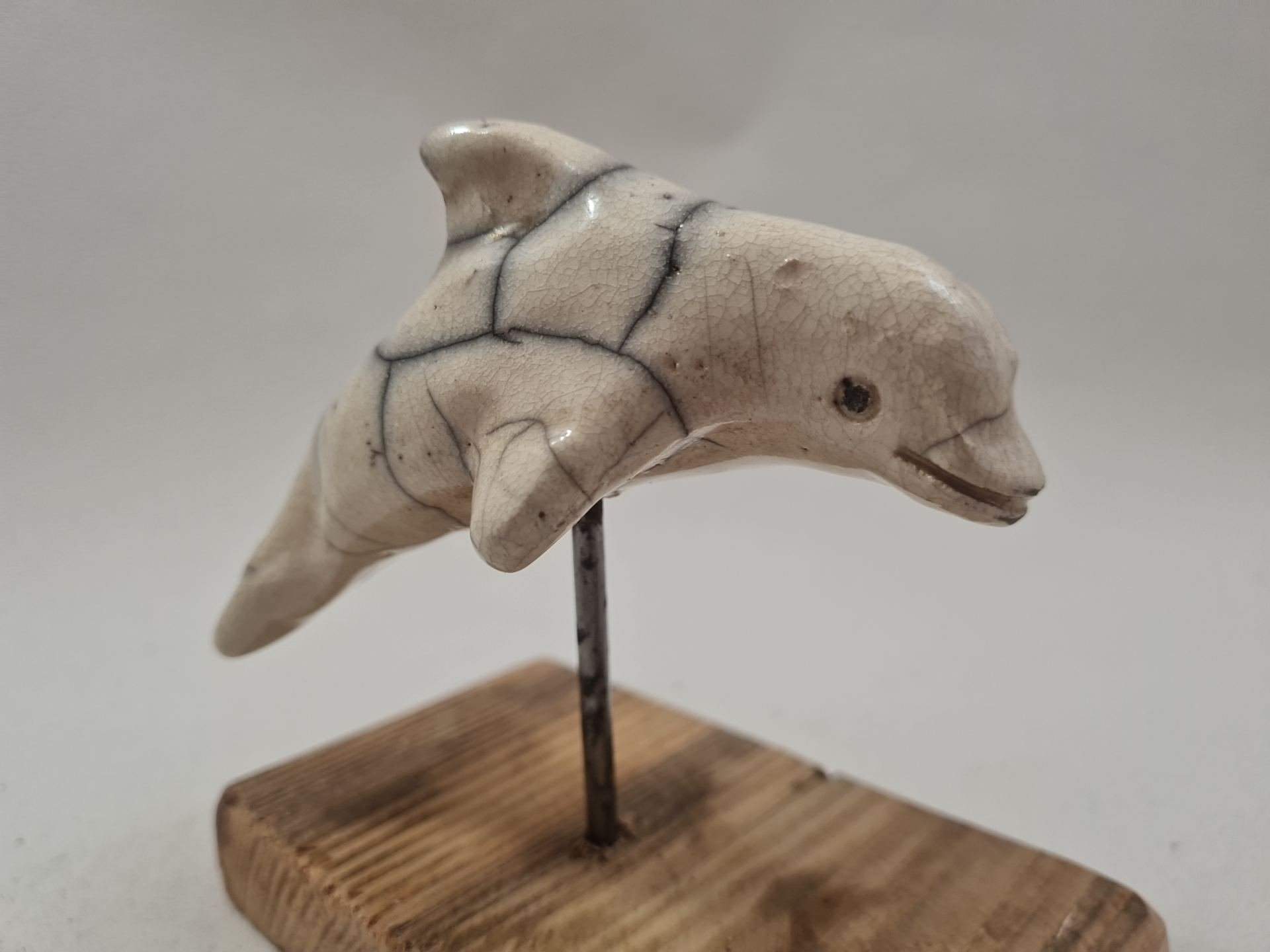 Dauphin " Skippy" en raku blanc craquelé